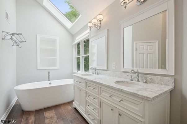 Bathroom, Dual Sink Vanities, Free Standing Baths, Interior, Wood Texture Flooring