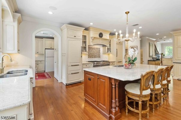 Chandelier, Interior, Kitchen, Recessed Lighting, Stainless Steel Appliances, Wood Texture Flooring