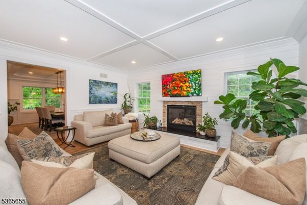 Dining room, Fireplace, Interior, Living room, Pendant Lights, Recessed Lighting, Wood Texture Flooring