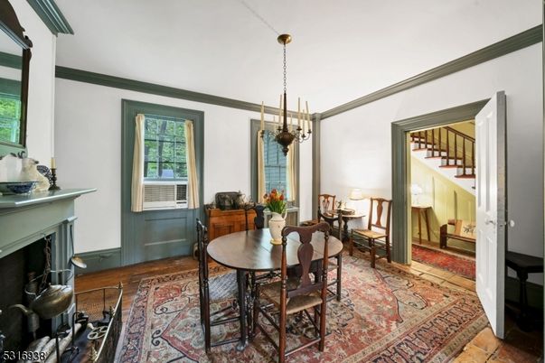 Dining room, Fireplace, Interior, Pendant Lights, Wood Texture Flooring