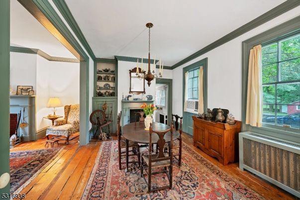Chandelier, Dining room, Fireplace, Interior, Pendant Lights, Wood Texture Flooring
