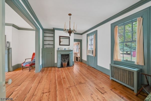 Chandelier, Empty room, Fireplace, Interior, Wood Texture Flooring