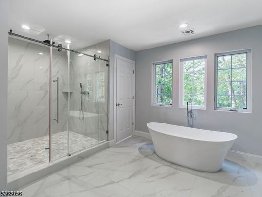 Bathroom, Free Standing Baths, Glass Shower, Interior, Marble, Marble Walls, Recessed Lighting