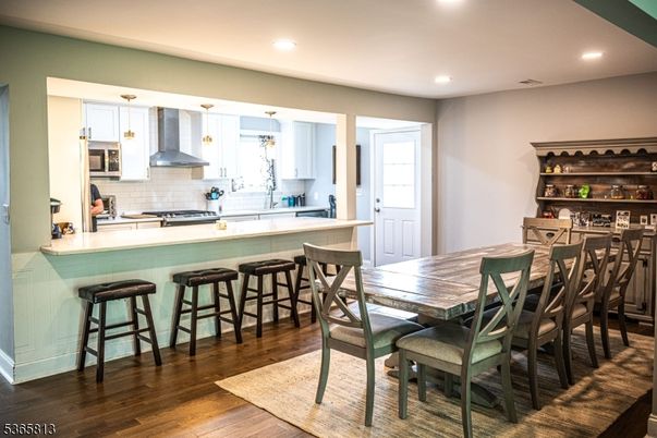 Dining room, Interior, Kitchen, Recessed Lighting, Stainless Steel Appliances, Wood Texture Flooring