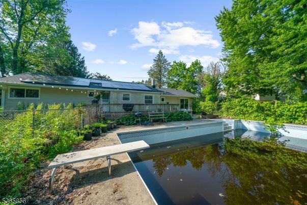 Exterior, Pool, Solar Panels