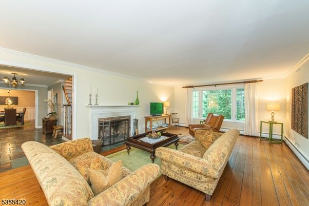 Chandelier, Dining room, Fireplace, Interior, Living room, Wood Texture Flooring