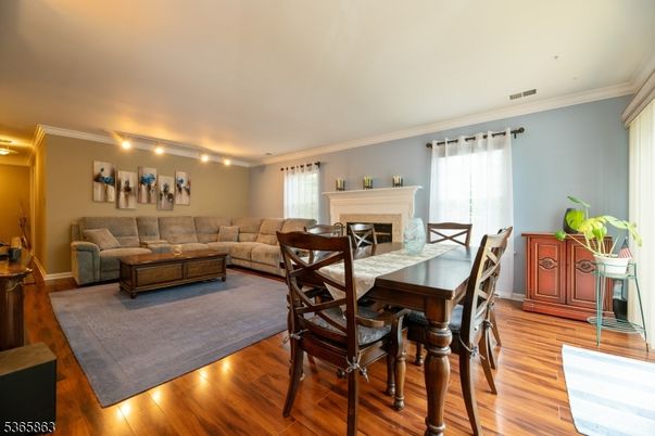 Dining room, Fireplace, Interior, Living room, Wood Texture Flooring