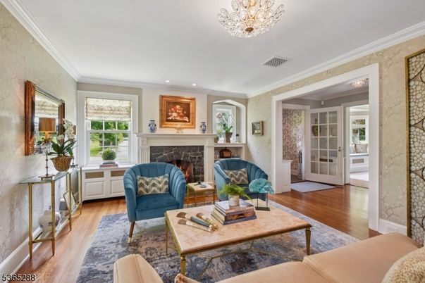 Chandelier, Fireplace, Interior, Living room, Recessed Lighting, Wood Texture Flooring