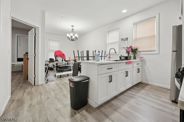 Chandelier, Dining room, Interior, Kitchen, Recessed Lighting, Wood Texture Flooring