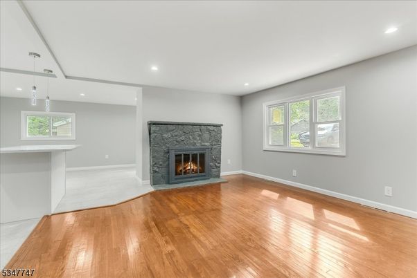 Empty room, Fireplace, Interior, Pendant Lights, Recessed Lighting, Wood Texture Flooring