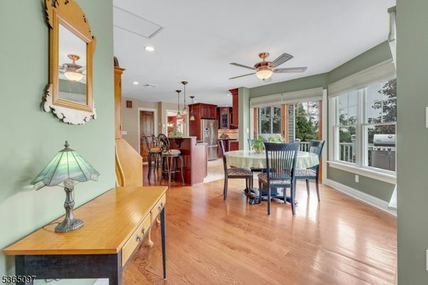 Dining room, Interior, Kitchen, Pendant Lights, Recessed Lighting, Stainless Steel Appliances, Wood Texture Flooring