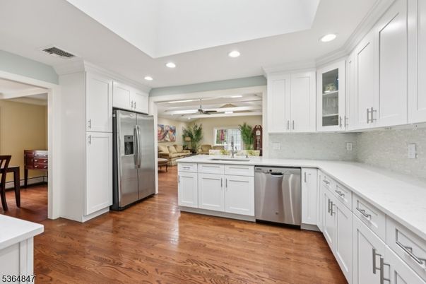 Dining room, Interior, Kitchen, Recessed Lighting, Stainless Steel Appliances, Wood Texture Flooring