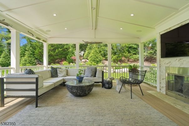 Fireplace, Interior, Recessed Lighting, Sun Room, Wood Texture Flooring