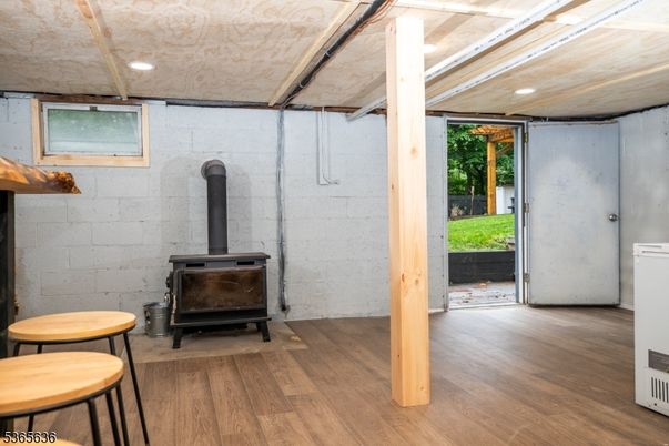 Fireplace, Interior, Recessed Lighting, Stone Walls, Wood Texture Flooring
