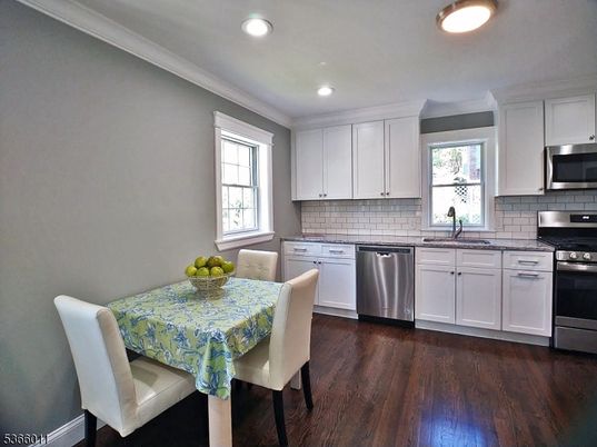Dining room, Interior, Kitchen, Recessed Lighting, Stainless Steel Appliances, Wood Texture Flooring