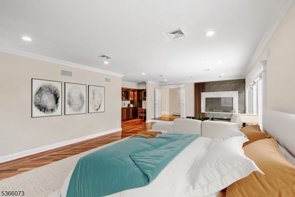 Bedroom, Fireplace, Interior, Recessed Lighting, Wood Texture Flooring