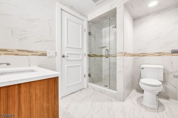 Bathroom, Glass Shower, Interior, Marble, Marble Walls, Recessed Lighting