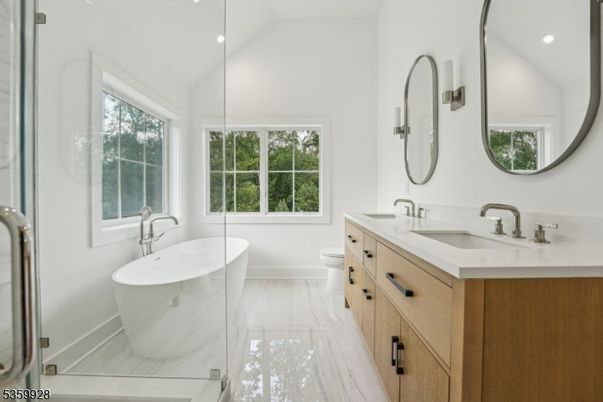 Bathroom, Dual Sink Vanities, Free Standing Baths, Interior, Marble, Recessed Lighting