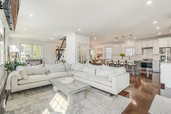 Dining room, Interior, Kitchen, Living room, Pendant Lights, Recessed Lighting, Stainless Steel Appliances, Wood Texture Flooring