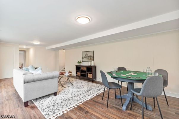 Dining room, Game Room, Interior, Living room, Recessed Lighting, Wood Texture Flooring