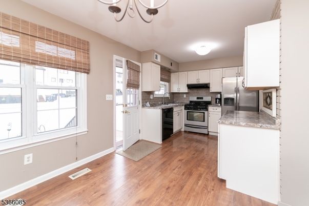 Chandelier, Interior, Kitchen, Stainless Steel Appliances, Wood Texture Flooring