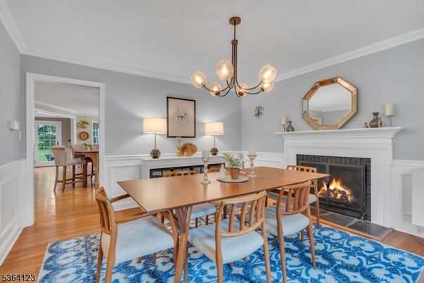 Dining room, Fireplace, Interior, Pendant Lights, Wood Texture Flooring