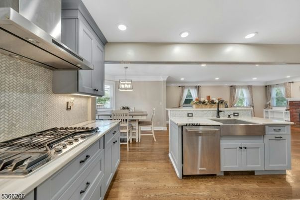 Dining room, Interior, Kitchen, Pendant Lights, Recessed Lighting, Stainless Steel Appliances, Wood Texture Flooring