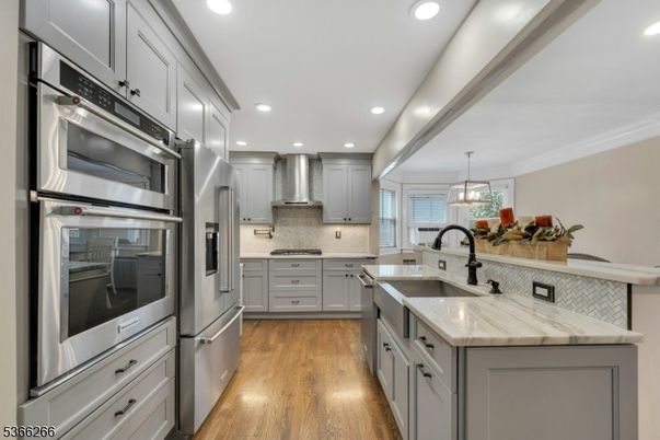 Interior, Kitchen, Pendant Lights, Recessed Lighting, Stainless Steel Appliances, Wood Texture Flooring