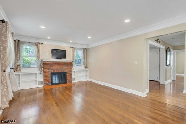 Empty room, Fireplace, Interior, Recessed Lighting, Wood Texture Flooring