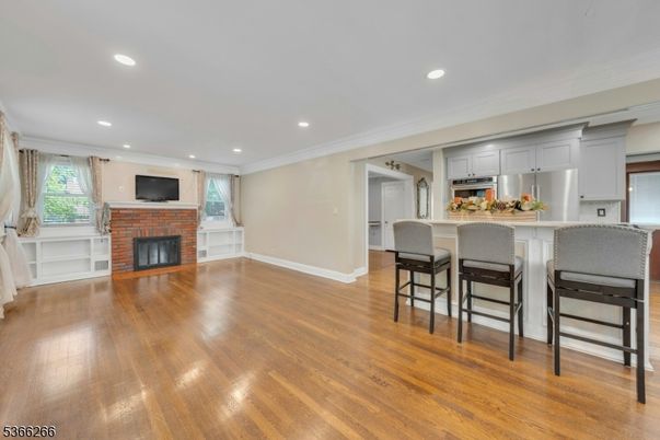 Fireplace, Interior, Kitchen, Recessed Lighting, Wood Texture Flooring