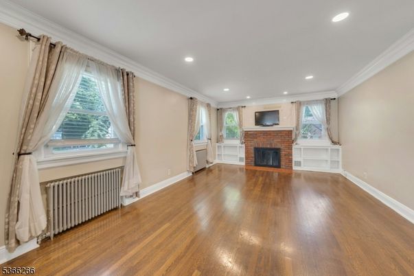 Empty room, Fireplace, Interior, Recessed Lighting, Wood Texture Flooring