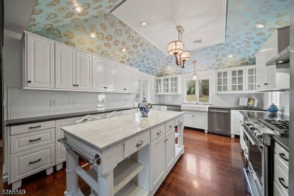 Chandelier, Interior, Kitchen, Pendant Lights, Recessed Lighting, Stainless Steel Appliances, Wood Texture Flooring