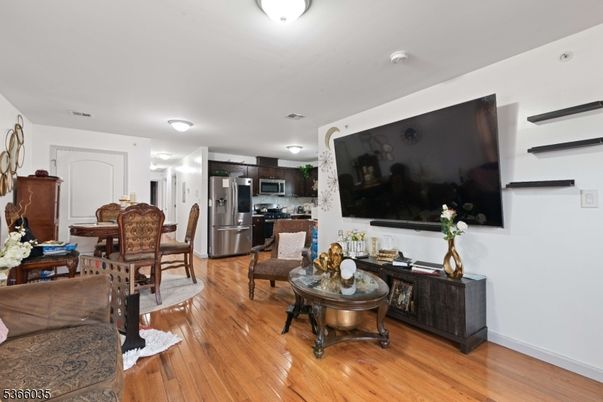 Dining room, Interior, Kitchen, Living room, Stainless Steel Appliances, Wood Texture Flooring