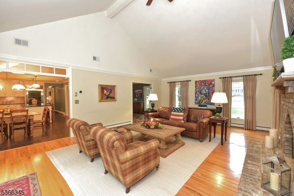Dining room, Fireplace, Interior, Kitchen, Living room, Pendant Lights, Stainless Steel Appliances, Wood Texture Flooring
