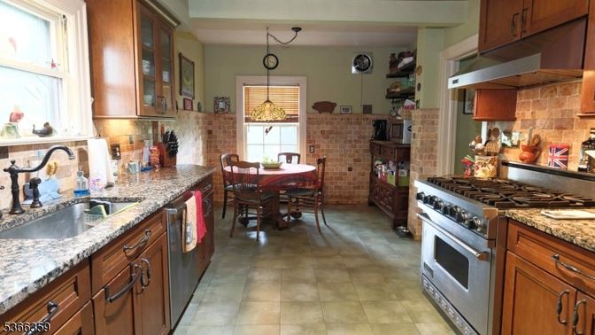 Dining room, Interior, Kitchen, Pendant Lights, Stainless Steel Appliances, Stone Walls