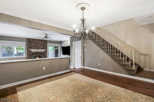 Chandelier, Fireplace, Interior, Recessed Lighting, Wood Texture Flooring