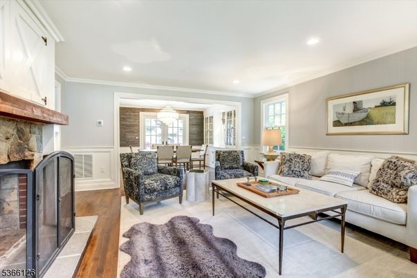Chandelier, Dining room, Fireplace, Interior, Living room, Recessed Lighting, Wood Texture Flooring