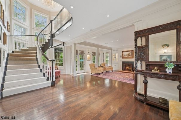 Chandelier, Fireplace, Interior, Living room, Recessed Lighting, Wood Texture Flooring