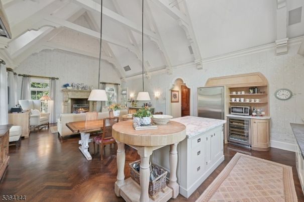 Dining room, Fireplace, Interior, Kitchen, Living room, Stainless Steel Appliances, Wood Texture Flooring