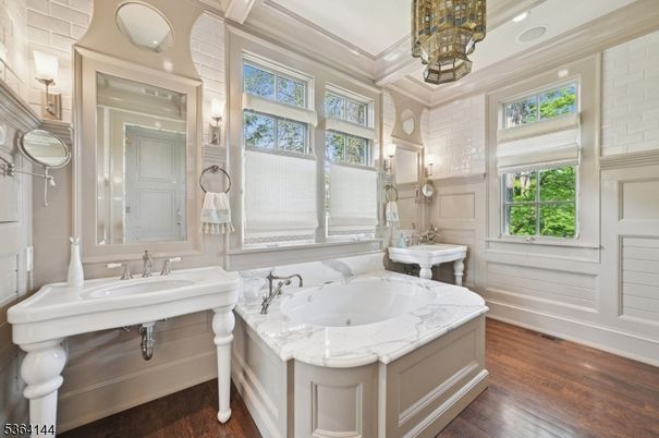 Bathroom, Chandelier, Dual Sink Vanities, Interior, Recessed Lighting, Wood Texture Flooring