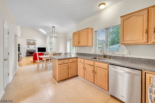 Dining room, Fireplace, Interior, Kitchen, Living room, Pendant Lights, Stainless Steel Appliances