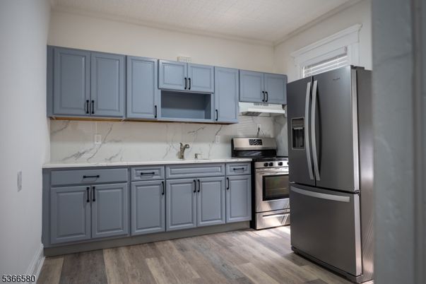 Interior, Kitchen, Marble Walls, Stainless Steel Appliances, Wood Texture Flooring