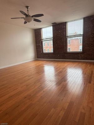 Empty room, Interior, Recessed Lighting, Stone Walls, Wood Texture Flooring
