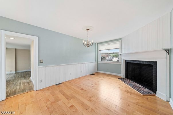 Chandelier, Empty room, Fireplace, Interior, Wood Texture Flooring