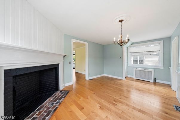 Chandelier, Empty room, Fireplace, Interior, Wood Texture Flooring