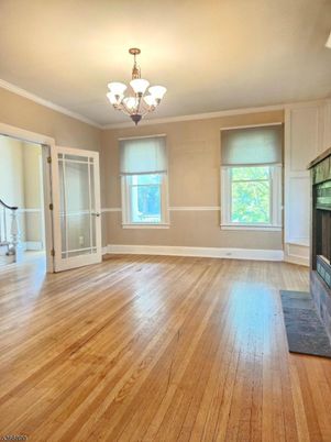 Chandelier, Empty room, Fireplace, Interior, Wood Texture Flooring