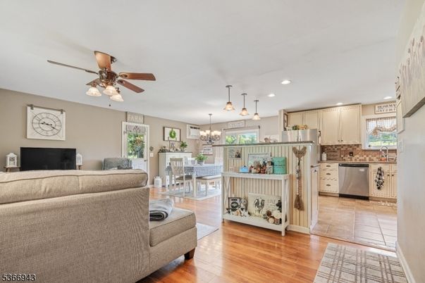 Chandelier, Dining room, Interior, Kitchen, Living room, Pendant Lights, Recessed Lighting, Wood Texture Flooring