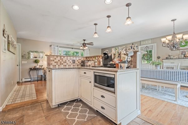 Chandelier, Dining room, Interior, Kitchen, Pendant Lights, Recessed Lighting, Wood Texture Flooring