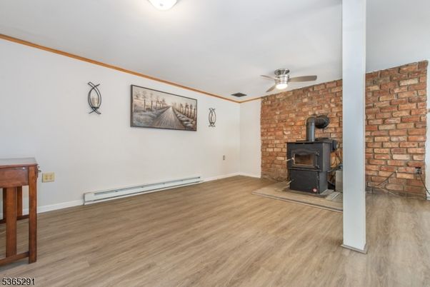 Empty room, Fireplace, Interior, Stone Walls, Wood Texture Flooring