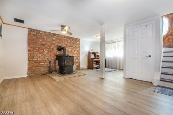 Empty room, Fireplace, Interior, Stone Walls, Wood Texture Flooring